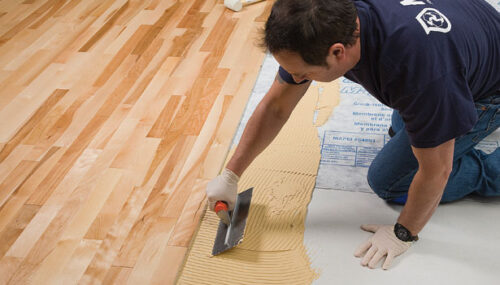 Sticking to Excellence: The Right Adhesives for Installing Your Hardwood Flooring